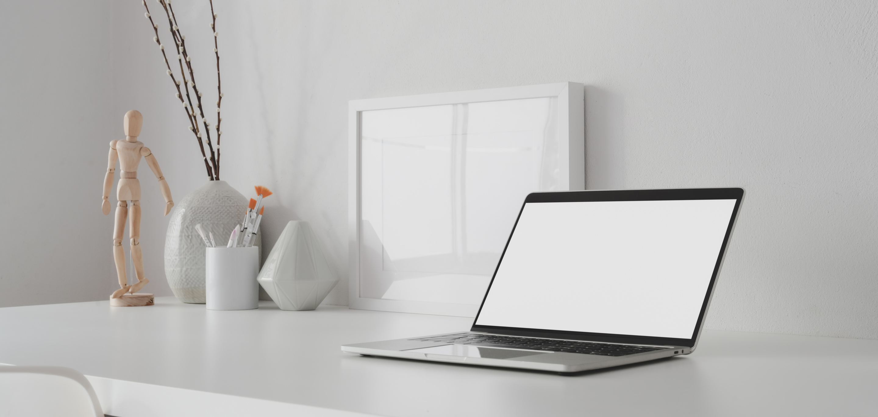 Macbook Pro on White Table